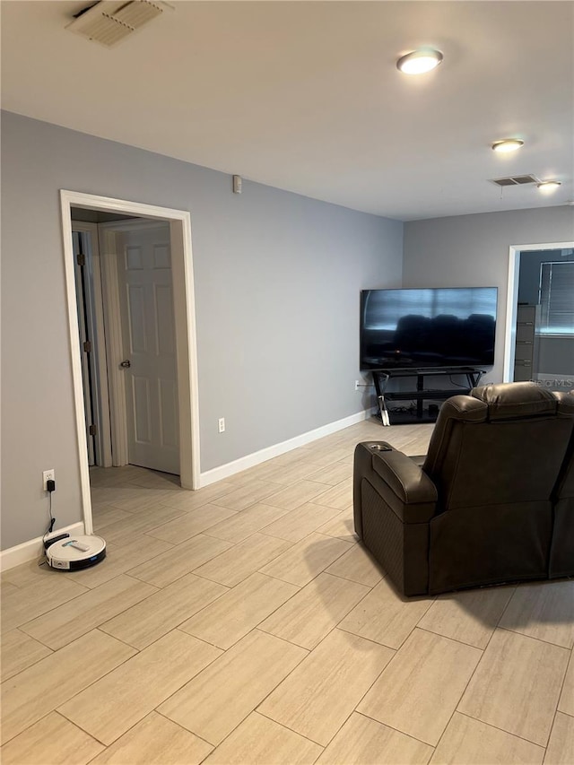 6345 Lambert Ln, New Port Richey, FL 34652 - living area with baseboards and wood tiled floors