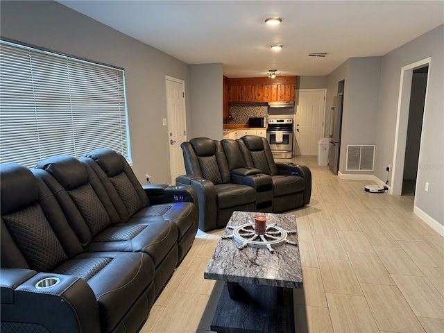 6345 Lambert Ln, New Port Richey, FL 34652 - living area with baseboards