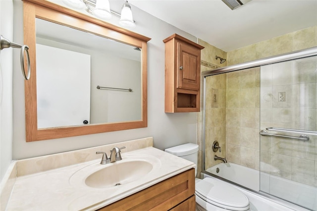 13501 Palmwood Ln Unit 0, Tampa, FL 33618 - bathroom with toilet, vanity, and shower / bath combination with glass door