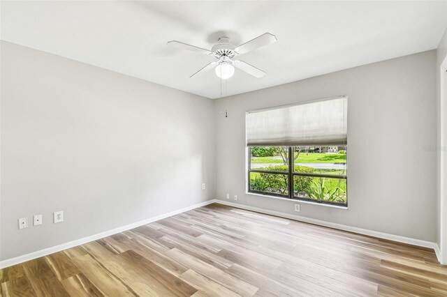 13501 Palmwood Ln Unit 0, Tampa, FL 33618 - unfurnished room featuring wood finished floors, ceiling fan, and baseboards