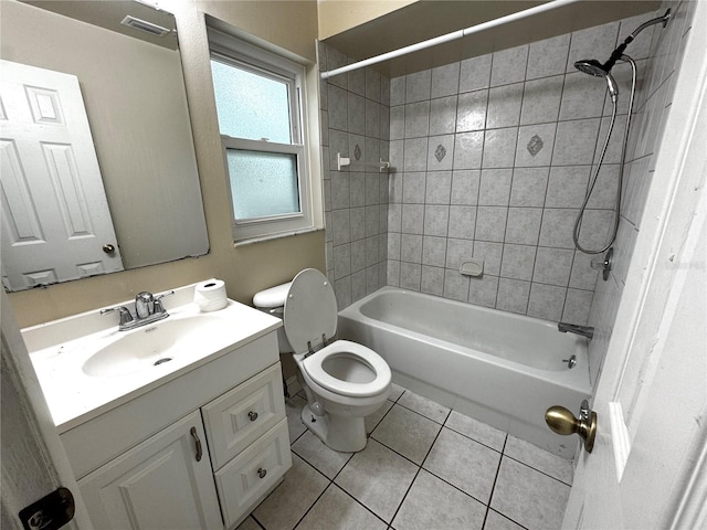3419 Pearson Rd, Valrico, FL 33596 - bathroom featuring tile patterned floors, toilet, vanity, and bathing tub / shower combination