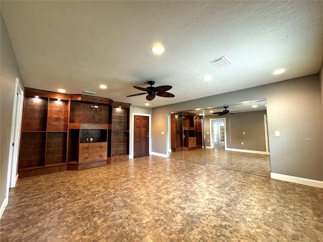 3419 Pearson Rd, Valrico, FL 33596 - unfurnished living room featuring ceiling fan, a textured ceiling, baseboards, and recessed lighting