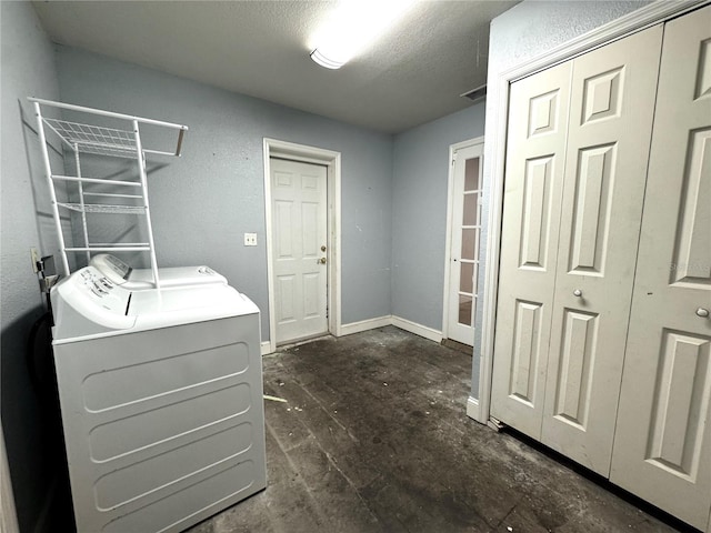 3419 Pearson Rd, Valrico, FL 33596 - washroom with independent washer and dryer, baseboards, and a textured ceiling
