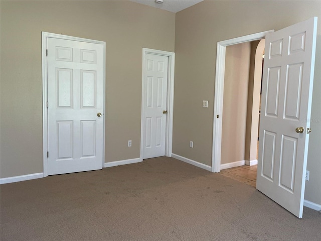10303 Park Commons Dr, Orlando, FL 32832 - unfurnished bedroom featuring carpet floors and baseboards