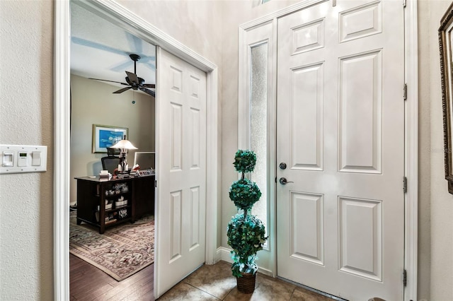 3302 Granite Ridge Loop, Land O Lakes, FL 34638 - tiled entryway featuring ceiling fan