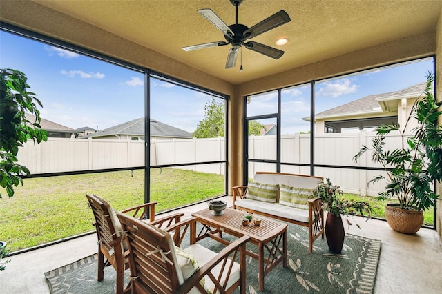 3302 Granite Ridge Loop, Land O Lakes, FL 34638 - sunroom / solarium featuring a ceiling fan and an outdoor living space