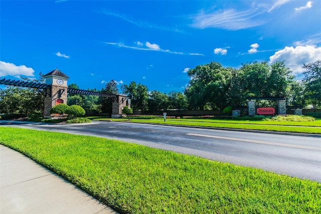 3302 Granite Ridge Loop, Land O Lakes, FL 34638 - view of asphalt street featuring curbs and sidewalks