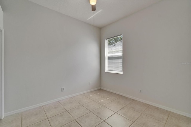 2803 Abbey Grove Dr, Valrico, FL 33594 - spare room with light tile patterned floors, ceiling fan, and baseboards