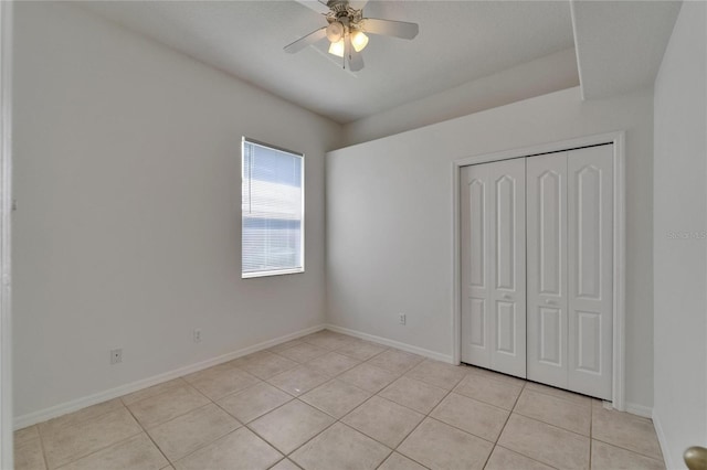2803 Abbey Grove Dr, Valrico, FL 33594 - unfurnished bedroom featuring light tile patterned flooring, a closet, baseboards, and ceiling fan