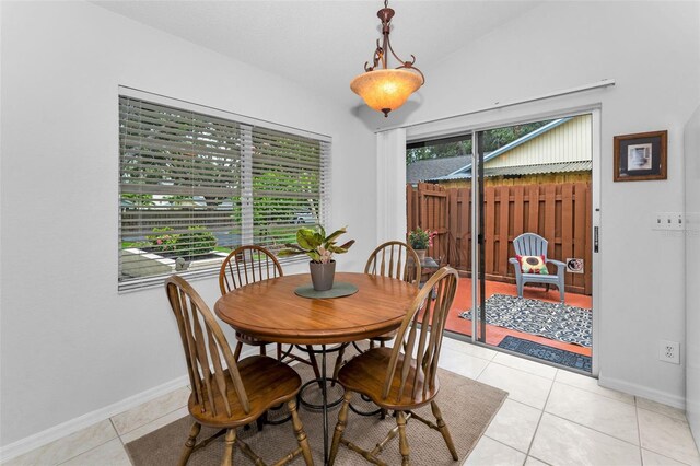 1948 Elaine Dr, Clearwater, FL 33760 - dining area with light tile patterned floors and baseboards