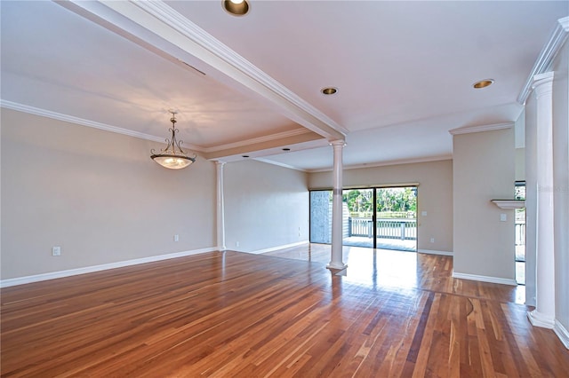 13635 Twin Lakes Ln Unit 13635, Tampa, FL 33618 - empty room with ornate columns, wood finished floors, baseboards, and ornamental molding