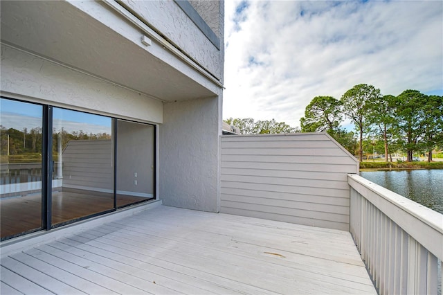13635 Twin Lakes Ln Unit 13635, Tampa, FL 33618 - wooden deck featuring a water view