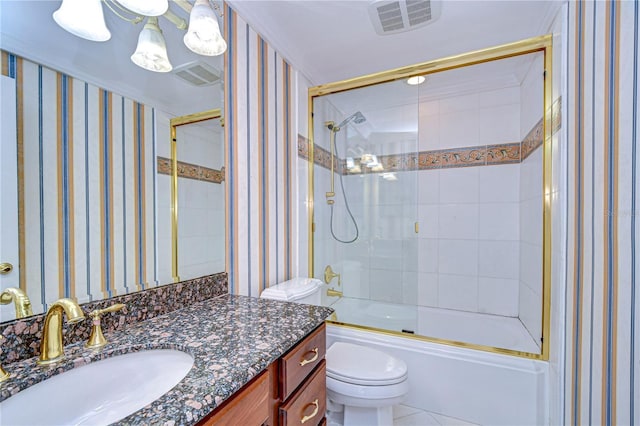 13635 Twin Lakes Ln Unit 13635, Tampa, FL 33618 - full bathroom with vanity, toilet, and combined bath / shower with glass door