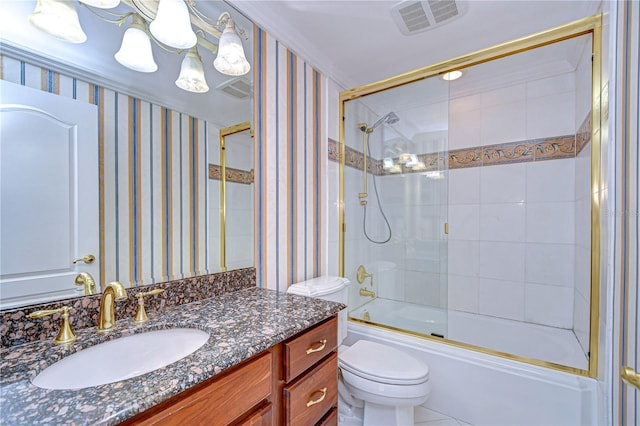13635 Twin Lakes Ln Unit 13635, Tampa, FL 33618 - full bathroom featuring vanity, toilet, combined bath / shower with glass door, and wallpapered walls