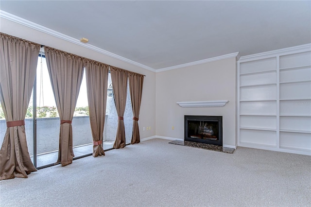 13635 Twin Lakes Ln Unit 13635, Tampa, FL 33618 - unfurnished living room featuring carpet, built in features, crown molding, baseboards, and a fireplace with raised hearth