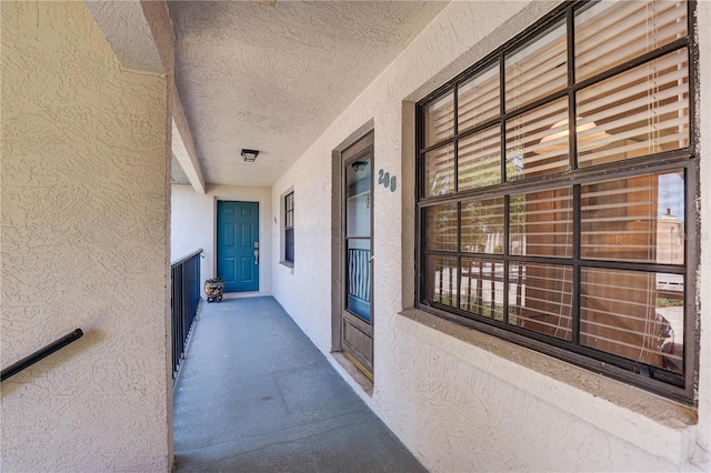 11800 Park Blvd Unit 208, Seminole, FL 33772 - property entrance featuring stucco siding