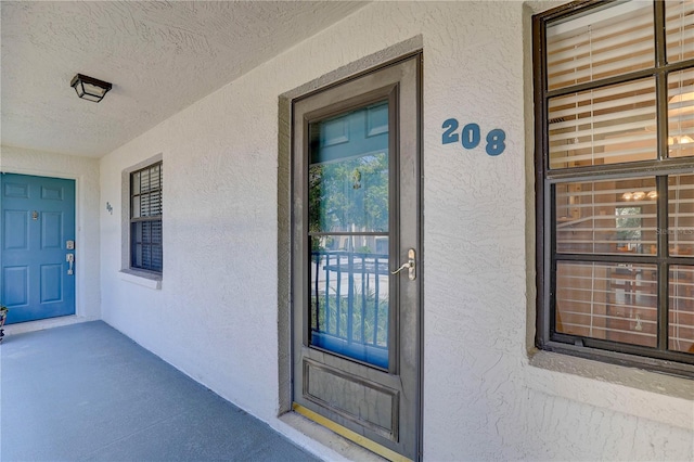 11800 Park Blvd Unit 208, Seminole, FL 33772 - entrance to property featuring stucco siding