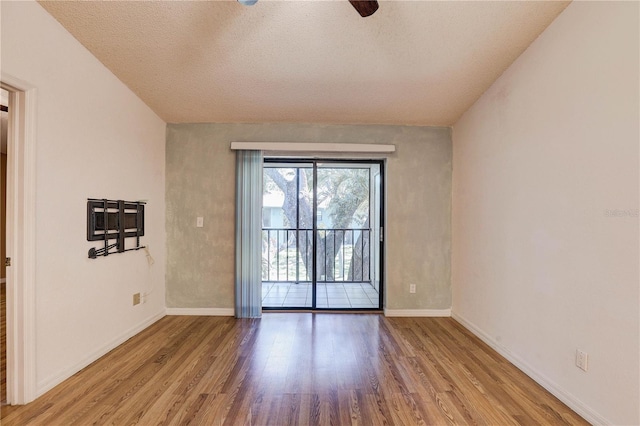 11800 Park Blvd Unit 208, Seminole, FL 33772 - empty room featuring wood finished floors and a ceiling fan