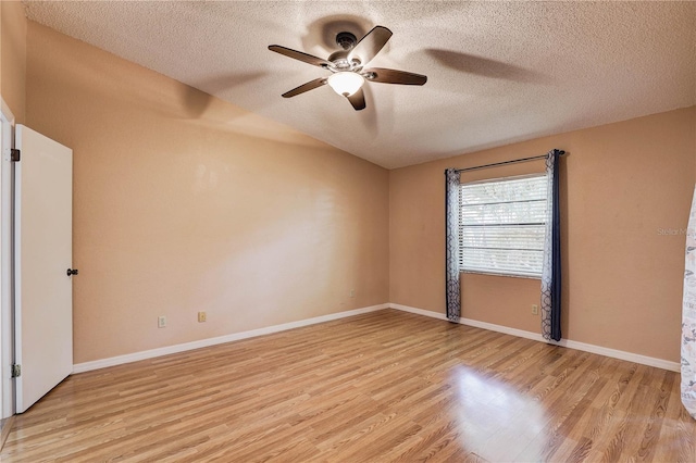 11800 Park Blvd Unit 208, Seminole, FL 33772 - spare room featuring a ceiling fan, a textured ceiling, and light wood-style flooring