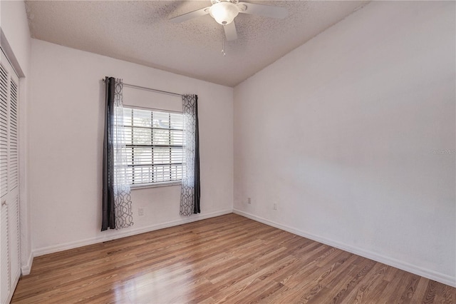 11800 Park Blvd Unit 208, Seminole, FL 33772 - unfurnished room with light wood-type flooring, a textured ceiling, and ceiling fan