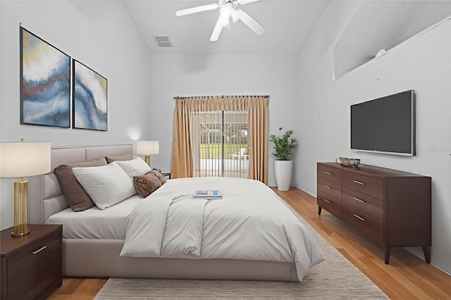 206 Forest Wood Ct, Spring Hill, FL 34609 - bedroom featuring lofted ceiling, light wood-style flooring, and ceiling fan