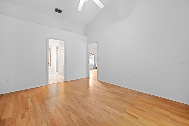 206 Forest Wood Ct, Spring Hill, FL 34609 - spare room featuring high vaulted ceiling, light wood-style floors, ceiling fan, and baseboards