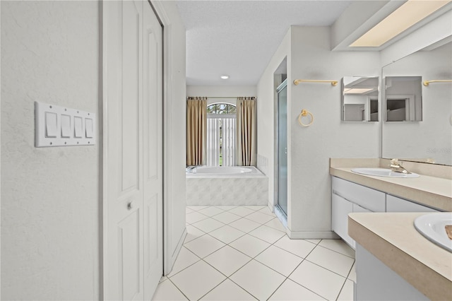 206 Forest Wood Ct, Spring Hill, FL 34609 - bathroom with vanity, a stall shower, a bath, tile patterned floors, and a closet
