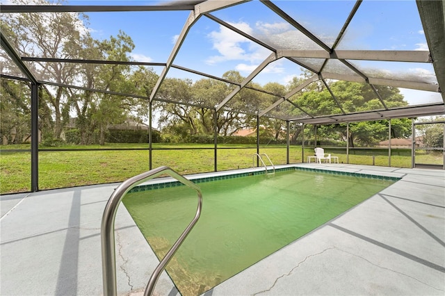 206 Forest Wood Ct, Spring Hill, FL 34609 - outdoor pool featuring a patio area, a yard, and a lanai