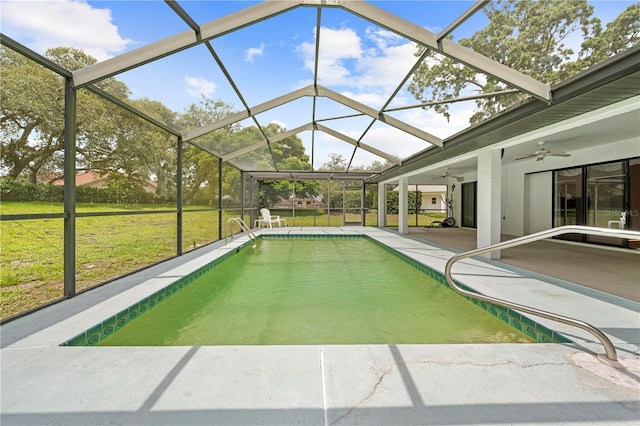 206 Forest Wood Ct, Spring Hill, FL 34609 - outdoor pool featuring a patio area, a lawn, ceiling fan, and a lanai