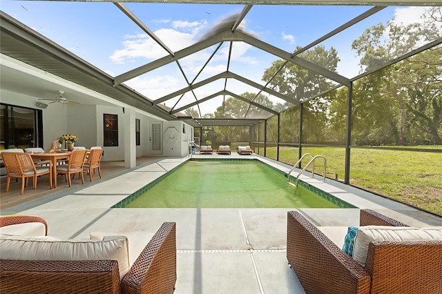 206 Forest Wood Ct, Spring Hill, FL 34609 - outdoor pool featuring an outdoor hangout area, a patio area, a ceiling fan, and a yard