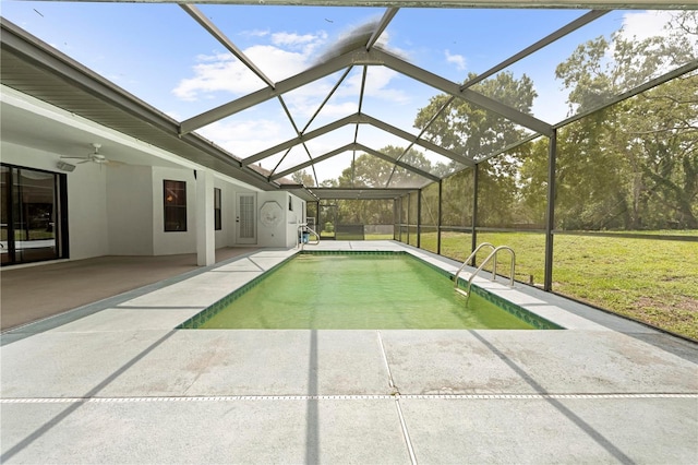206 Forest Wood Ct, Spring Hill, FL 34609 - outdoor pool featuring a patio area, a lawn, and a ceiling fan