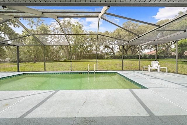 206 Forest Wood Ct, Spring Hill, FL 34609 - outdoor pool featuring a patio area, a lawn, and glass enclosure