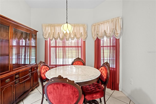 206 Forest Wood Ct, Spring Hill, FL 34609 - dining room featuring light tile patterned floors and healthy amount of natural light