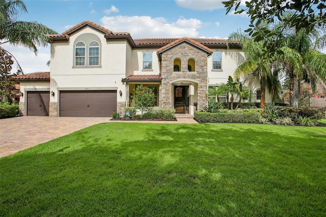 19711 Wellington Manor Blvd, Lutz, FL 33549 - mediterranean / spanish-style home featuring stone siding, stucco siding, a front yard, and a tiled roof