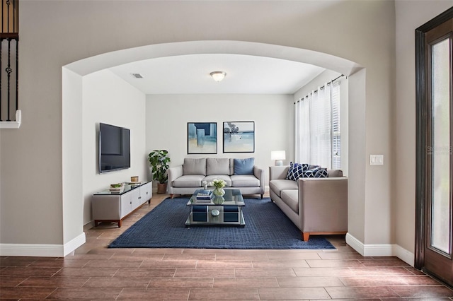 19711 Wellington Manor Blvd, Lutz, FL 33549 - living area featuring arched walkways and wood finish floors
