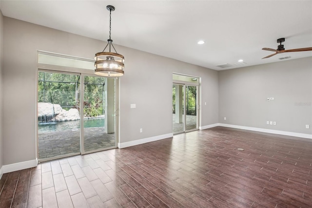 19711 Wellington Manor Blvd, Lutz, FL 33549 - spare room with a ceiling fan, wood finished floors, and recessed lighting