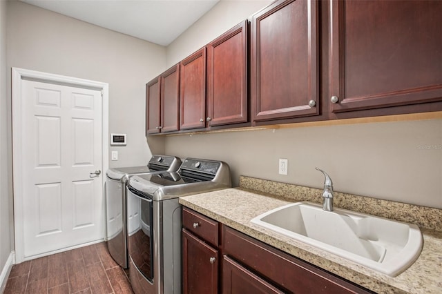 19711 Wellington Manor Blvd, Lutz, FL 33549 - laundry area with independent washer and dryer, cabinet space, and wood tiled floors