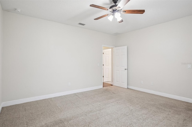 19711 Wellington Manor Blvd, Lutz, FL 33549 - carpeted empty room with baseboards and ceiling fan