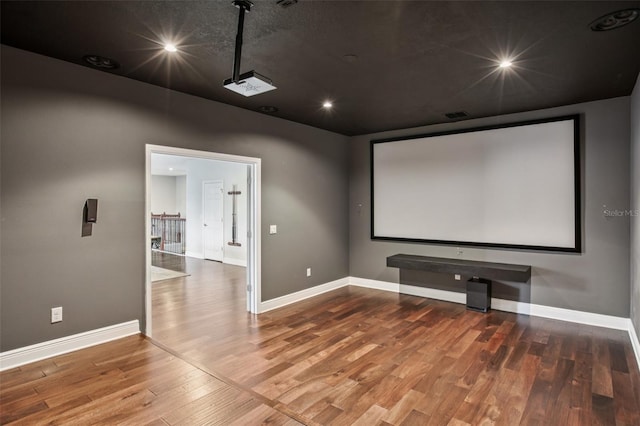 19711 Wellington Manor Blvd, Lutz, FL 33549 - home theater featuring wood finished floors and recessed lighting