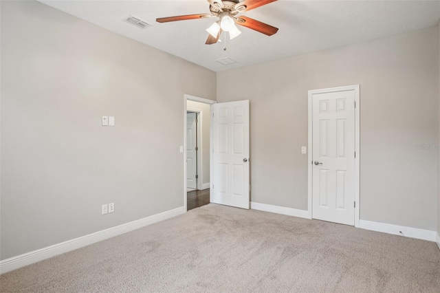 19711 Wellington Manor Blvd, Lutz, FL 33549 - unfurnished bedroom with carpet floors and a ceiling fan