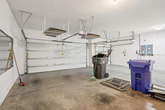 19711 Wellington Manor Blvd, Lutz, FL 33549 - garage featuring a garage door opener and concrete block wall