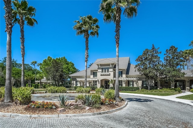 11938 Royce Waterford Cir, Tampa, FL 33626 - view of property featuring curved driveway