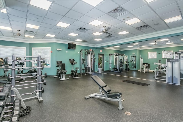11938 Royce Waterford Cir, Tampa, FL 33626 - workout area featuring a drop ceiling, crown molding, and baseboards