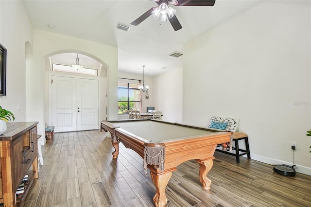 4608 Scott Rd, Lutz, FL 33558 - rec room with arched walkways, wood finished floors, ceiling fan, billiards table, and baseboards