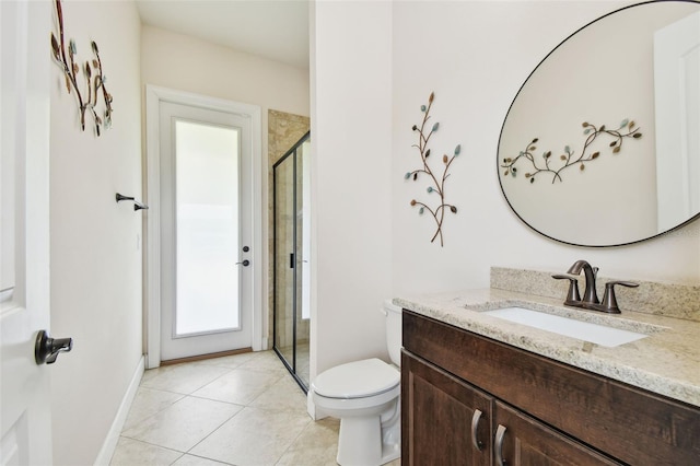4608 Scott Rd, Lutz, FL 33558 - full bath with vanity, a stall shower, toilet, tile patterned flooring, and baseboards