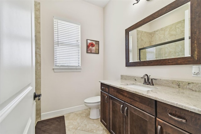 4608 Scott Rd, Lutz, FL 33558 - bathroom with vanity, toilet, tiled shower, baseboards, and tile patterned floors