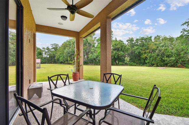 4608 Scott Rd, Lutz, FL 33558 - view of patio featuring ceiling fan and view of wooded area