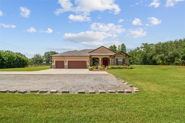 4608 Scott Rd, Lutz, FL 33558 - view of front of property featuring stone siding, an attached garage, and driveway
