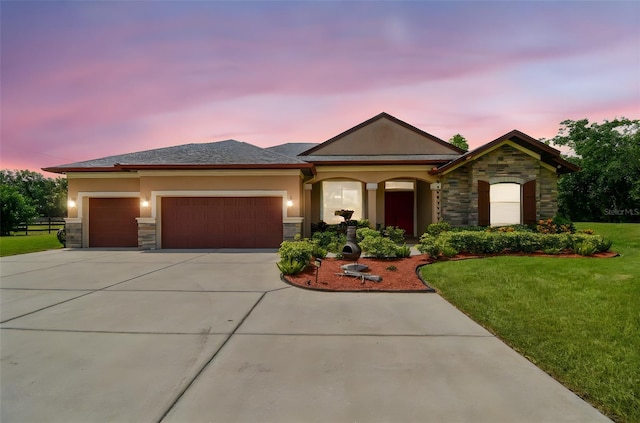 4608 Scott Rd, Lutz, FL 33558 - view of front of home with stone siding, a lawn, concrete driveway, and a garage