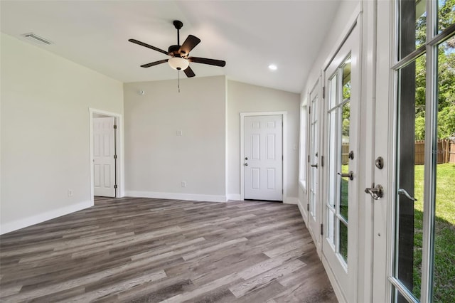 816 9th Ave SW, Largo, FL 33770 - unfurnished room featuring vaulted ceiling, a ceiling fan, wood finished floors, baseboards, and recessed lighting